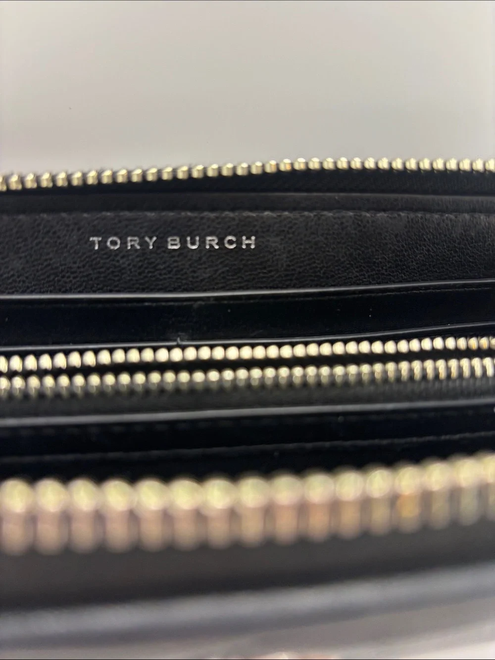 Tory Burch Black Quilted Zip Wallet with Silver Logo